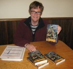 Kevin of author duo, KD Berry, with "Dragons Away" (Bluewood Publishing)